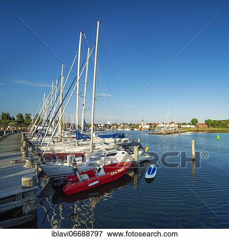 Jetty and sailboats in the harbour of Timmendorf on the island of Poel, Mecklenburg-Vorpommern, Germany, Europe View Large Photo Image Stock Photo - Jetty and sailboats in the harbour of Timmendorf on the island of Poel, Mecklenburg-Vorpommern, Germany, Europe. Fotosearch