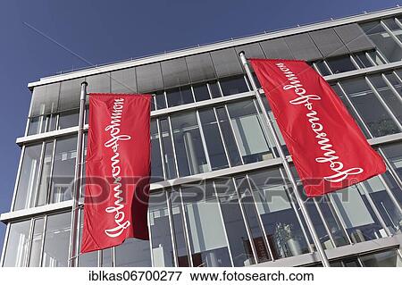 Johnson & Johnson, flags with logo in front of the German headquarters, American pharmaceutical and consumer goods manufacturer, Neuss, North Rhine-Westphalia, Germany, Europe View Large Photo Image Stock Photo - Johnson & Johnson, flags with logo in front of the German headquarters, American pharmaceutical and consumer goods manufacturer, Neuss, North Rhine-Westphalia, Germany, Europe. Fotosearch
