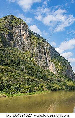 Karst mountains, Nam Ou River, Nong Khiaw, Luang Prabang, Laos, Asia View Large Photo Image Stock Photo - Karst mountains, Nam Ou River, Nong Khiaw, Luang Prabang, Laos, Asia. Fotosearch