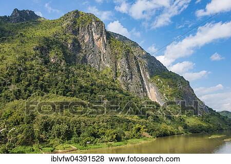 Karst mountains, Nam Ou River, Nong Khiaw, Luang Prabang, Laos, Asia View Large Photo Image Stock Photo - Karst mountains, Nam Ou River, Nong Khiaw, Luang Prabang, Laos, Asia. Fotosearch