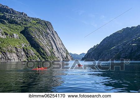 Stock Image - Kayaks on the fjord Trollfjord at Raftsund, Lofoten, Nordland, Norway, Europe. Fotosearch