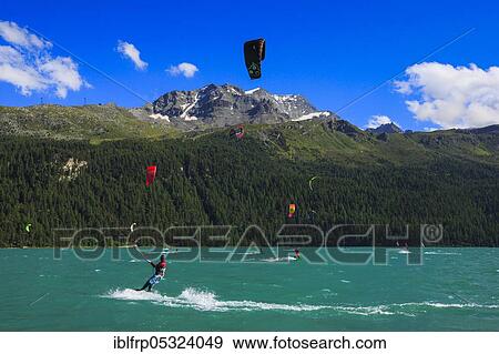 Stock Photo - Kitesurfing, Lake Silvaplana, Piz Corvatsch, Graubuenden, Switzerland, Europe. Fotosearch