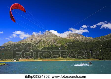 Stock Image - Kitesurfing, Lake Silvaplana, Upper Engadine, Graubuenden, Switzerland, Europe. Fotosearch