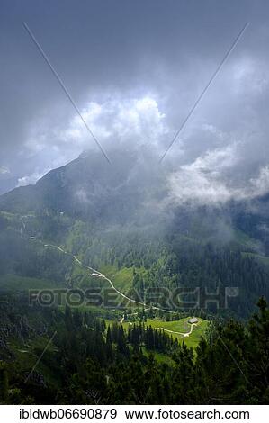 Stock Photo - Königsbergalm with Schneibstein in clouds, fog from Jenner, Berchtesgadener Land, Upper Bavaria, Bavaria, Germany, Europe. Fotosearch