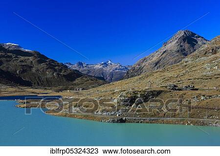 Lago Bianco, Bernina Pass, Upper Engadine, Graubuenden, Switzerland, Europe View Large Photo Image Stock Image - Lago Bianco, Bernina Pass, Upper Engadine, Graubuenden, Switzerland, Europe. Fotosearch