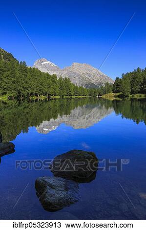 Stock Image - Lake Palpuogna, Albulapass, Graubuenden, Switzerland, Europe. Fotosearch