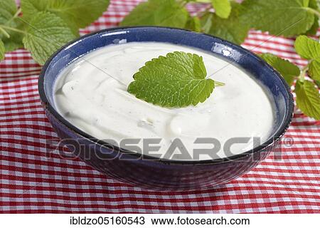 Stock Image - Lemon balm curd cream (Melissa officinalis). Fotosearch