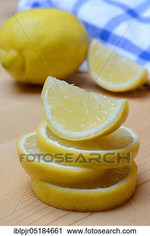 Lemon ( Citrus limon) slice, slices, quarters, quartered View Large Photo Image Stock Image - Lemon ( Citrus limon) slice, slices, quarters, quartered. Fotosearch