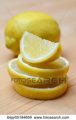 Lemon ( Citrus limon) slice, slices, quarters, quartered View Large Photo Image Stock Photo - Lemon ( Citrus limon) slice, slices, quarters, quartered. Fotosearch