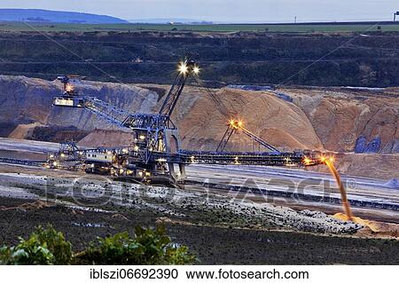Lignite opencast mine with stacker, Garzweiler, Jüchen, Rheinische Braunkohlerevier, North Rhine-Westphalia, Germany, Europe View Large Photo Image Stock Image - Lignite opencast mine with stacker, Garzweiler, Jüchen, Rheinische Braunkohlerevier, North Rhine-Westphalia, Germany, Europe. Fotosearch