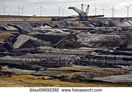 Lignite opencast mine with stacker, Garzweiler, Jüchen, Rheinische Braunkohlerevier, North Rhine-Westphalia, Germany, Europe View Large Photo Image Stock Image - Lignite opencast mine with stacker, Garzweiler, Jüchen, Rheinische Braunkohlerevier, North Rhine-Westphalia, Germany, Europe. Fotosearch