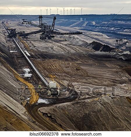 Lignite opencast mine with stacker, Garzweiler, Jüchen, Rheinische Braunkohlerevier, North Rhine-Westphalia, Germany, Europe View Large Photo Image Stock Photo - Lignite opencast mine with stacker, Garzweiler, Jüchen, Rheinische Braunkohlerevier, North Rhine-Westphalia, Germany, Europe. Fotosearch