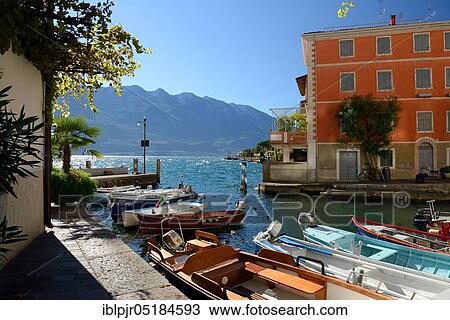 Limone sul Garda, Port with boats, Lake Garda, Province of Brescia, Italy, Europe View Large Photo Image Stock Image - Limone sul Garda, Port with boats, Lake Garda, Province of Brescia, Italy, Europe. Fotosearch