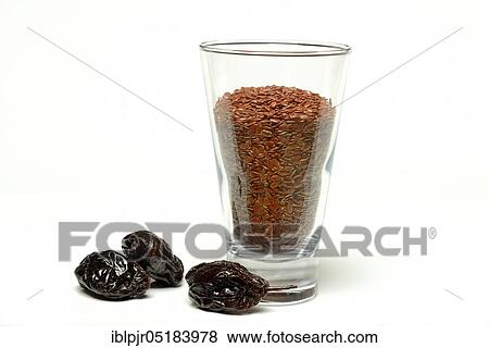 Stock Photo - Linseed and prunes, linseed, seed flax, plum, prunes, prunes, dried plums, prunes, dried plum. Fotosearch