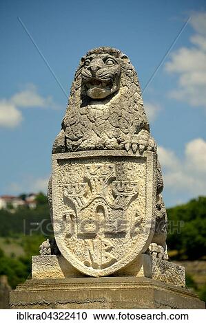 Stock Image - Lion statue with coat of arms, Tsarevets Fortress, Veliko Tarnovo, Bulgaria, Europe. Fotosearch