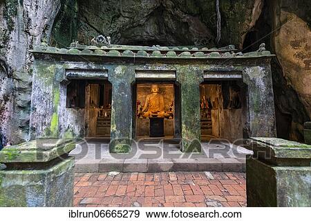 Stock Photo - Little temple in a cave, Marble mountains, Da Nang, Vietnam, Asia. Fotosearch
