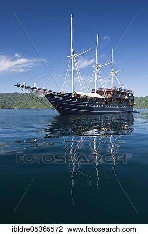 Stock Image - Liveaboard ship Amira, Triton Bay, West Papua, Indonesia, Asia. Fotosearch