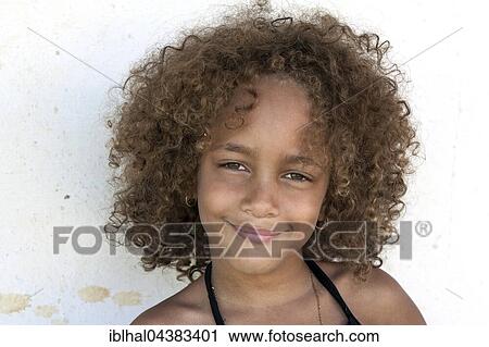 Local Cuban girl with curly hair, portrait, in Baracoa, Guantánamo Province, Cuba, Central America View Large Photo Image Stock Image - Local Cuban girl with curly hair, portrait, in Baracoa, Guantánamo Province, Cuba, Central America. Fotosearch