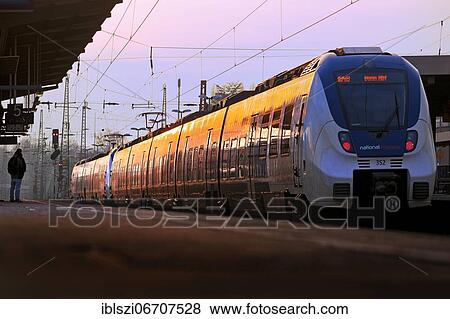 Local train at Oberbarmen station in the evening light, Wuppertal, Bergisches Land, North Rhine-Westphalia, Germany, Europe View Large Photo Image Stock Photo - Local train at Oberbarmen station in the evening light, Wuppertal, Bergisches Land, North Rhine-Westphalia, Germany, Europe. Fotosearch