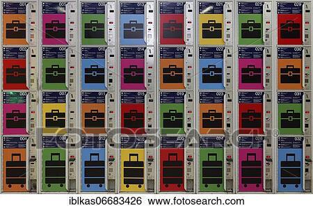 Stock Photograph - Lockers with colorful pictograms, Düsseldorf main station, North Rhine-Westphalia, Germany, Europe. Fotosearch