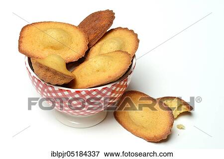 Madeleines in bowl View Large Photo Image Stock Photo - Madeleines in bowl. Fotosearch