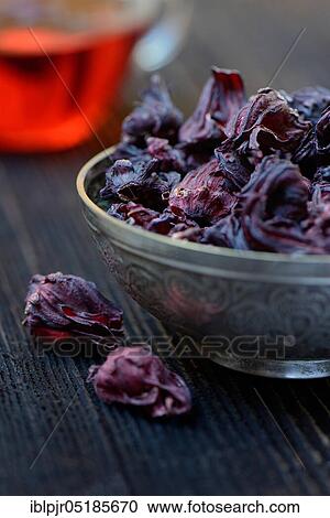 Mallow tea ( Hibiscus sabdariffa) dried flowers in bowl, hibiscus tea View Large Photo Image Stock Image - Mallow tea ( Hibiscus sabdariffa) dried flowers in bowl, hibiscus tea. Fotosearch