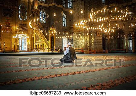 Stock Photo - Man praying in mosque, Istanbul, Turkey, Asia. Fotosearch