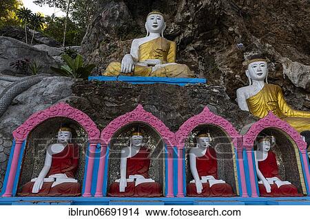 Picture - Many buddhas in the Kaw Ka Thawng cave, Hpa-An, Kayin state, Myanmar, Asia. Fotosearch