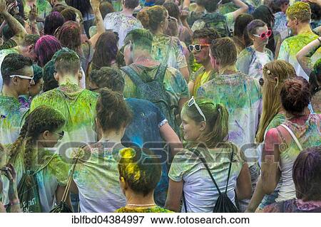 Many young women and man are colored by colorpowder at the colorful Holi festival, Dresden, Saxony, Germany, Europe View Large Photo Image Stock Photo - Many young women and man are colored by colorpowder at the colorful Holi festival, Dresden, Saxony, Germany, Europe. Fotosearch