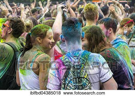 Many young women and man are colored by colorpowder at the colorful Holi festival, Dresden, Saxony, Germany, Europe View Large Photo Image Stock Photo - Many young women and man are colored by colorpowder at the colorful Holi festival, Dresden, Saxony, Germany, Europe. Fotosearch