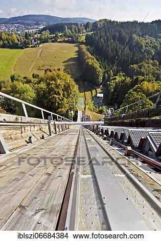 Meinhardus ski jump, view from above into the inrun, ski jump, Meinerzhagen, Sauerland, North Rhine-Westphalia, Germany, Europe View Large Photo Image Picture - Meinhardus ski jump, view from above into the inrun, ski jump, Meinerzhagen, Sauerland, North Rhine-Westphalia, Germany, Europe. Fotosearch