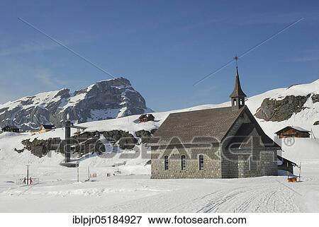 Melchsee-Frutt, chapel and panorama lift, skiing area in the Swiss Alps, Canton Obwalden, Switzerland, Europe View Large Photo Image Stock Photo - Melchsee-Frutt, chapel and panorama lift, skiing area in the Swiss Alps, Canton Obwalden, Switzerland, Europe. Fotosearch