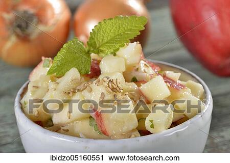 Stock Image - Melissa-Apple-Onion Salad. Fotosearch