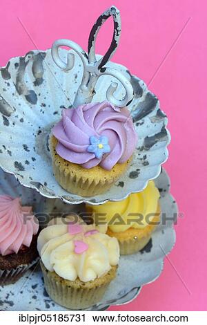 Mini cupcakes in a cake stand View Large Photo Image Stock Image - Mini cupcakes in a cake stand. Fotosearch