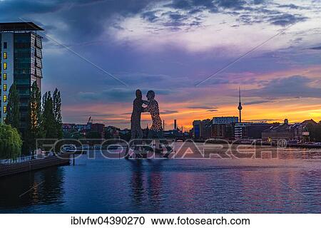Molecule Man, monumental artwork by Jonathan Borofsky by Jonathan Borofsky, River Spree, TV Tower, sunset, Treptow, Berlin, Germany, Europe View Large Photo Image Stock Image - Molecule Man, monumental artwork by Jonathan Borofsky by Jonathan Borofsky, River Spree, TV Tower, sunset, Treptow, Berlin, Germany, Europe. Fotosearch