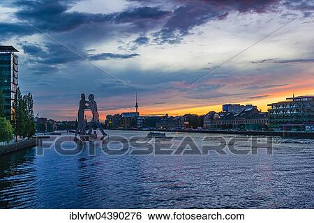 Molecule Man, monumental artwork by Jonathan Borofsky by Jonathan Borofsky, River Spree, TV Tower, sunset, Treptow, Berlin, Germany, Europe View Large Photo Image Stock Photograph - Molecule Man, monumental artwork by Jonathan Borofsky by Jonathan Borofsky, River Spree, TV Tower, sunset, Treptow, Berlin, Germany, Europe. Fotosearch
