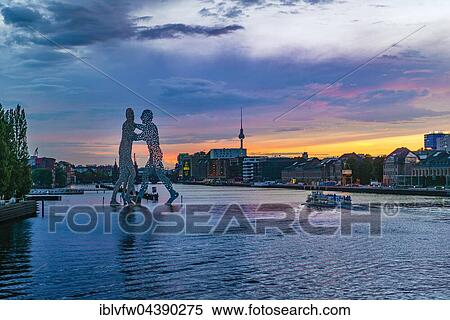 Molecule Man, monumental artwork by Jonathan Borofsky by Jonathan Borofsky, River Spree, TV Tower, sunset, Treptow, Berlin, Germany, Europe View Large Photo Image Stock Photography - Molecule Man, monumental artwork by Jonathan Borofsky by Jonathan Borofsky, River Spree, TV Tower, sunset, Treptow, Berlin, Germany, Europe. Fotosearch