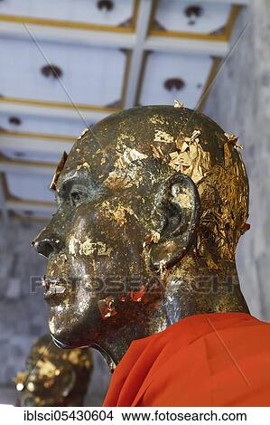 Monk's head covered with gold leaf, Wat Chalong, temple on Phuket, Thailand, Asia View Large Photo Image Picture - Monk's head covered with gold leaf, Wat Chalong, temple on Phuket, Thailand, Asia. Fotosearch