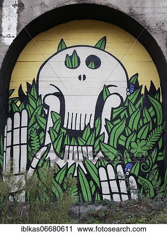 Monster eats green vegetation, warning against environmental destruction, symbolic mural by streetart artist Mexer, Max Fiedler, Düsseldorf, North Rhine-Westphalia, Germany, Europe View Large Photo Image Stock Image - Monster eats green vegetation, warning against environmental destruction, symbolic mural by streetart artist Mexer, Max Fiedler, Düsseldorf, North Rhine-Westphalia, Germany, Europe. Fotosearch