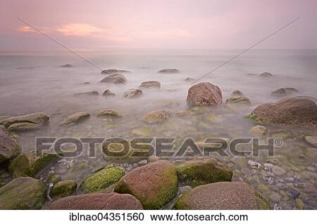 Morning atmosphere, sea, pebble beach, Baltic coast, Sassnitz, Jasmund National Park, Rügen, Mecklenburg-Western Pomerania, Germany, Europe View Large Photo Image Stock Image - Morning atmosphere, sea, pebble beach, Baltic coast, Sassnitz, Jasmund National Park, Rügen, Mecklenburg-Western Pomerania, Germany, Europe. Fotosearch