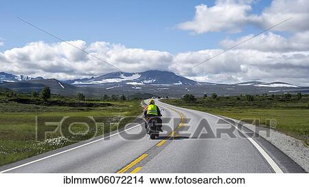 Motorcyclists on road through tundra, country road, Dovrefjell National Park, Oppdal, Norway, Europe View Large Photo Image Picture - Motorcyclists on road through tundra, country road, Dovrefjell National Park, Oppdal, Norway, Europe. Fotosearch