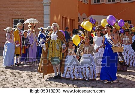 Mozartfest 2014, numerous participants in historical dress in front of the castle, Schwetzingen, Baden-Württemberg, Germany, Europe View Large Photo Image Stock Image - Mozartfest 2014, numerous participants in historical dress in front of the castle, Schwetzingen, Baden-Württemberg, Germany, Europe. Fotosearch