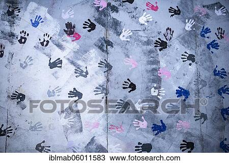 Mural Touch The Wall, Mural Hands with Handprints, detail view, artist Christine Kühn, East Side Gallery, Mauergalerie, Berlin, Germany, Europe View Large Photo Image Stock Image - Mural Touch The Wall, Mural Hands with Handprints, detail view, artist Christine Kühn, East Side Gallery, Mauergalerie, Berlin, Germany, Europe. Fotosearch