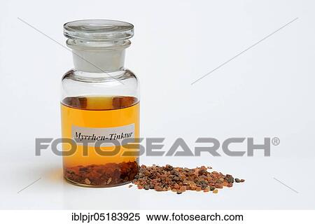 Stock Photography - Myrrh tincture (Commiphora myrrha) and myrrh resin, myrrh resin, resin, myrrh, myrrh tincture, incense resin, incense. Fotosearch