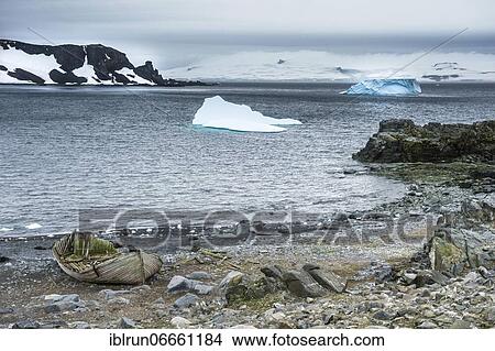 Old cargo boat on the shores of Half moon island, South Sheltand islands, Antarctica View Large Photo Image Picture - Old cargo boat on the shores of Half moon island, South Sheltand islands, Antarctica. Fotosearch
