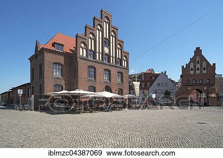Old customs house with water gate in the Old Port, Wismar, Mecklenburg-Western Pomerania, Germany, Europe View Large Photo Image Stock Photo - Old customs house with water gate in the Old Port, Wismar, Mecklenburg-Western Pomerania, Germany, Europe. Fotosearch