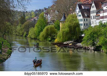 Stock Image - Old town of Tübingen with Hölderlin Tower on the Neckar, punting boat, punting boats, Baden-Württemberg, Germany, Europe. Fotosearch