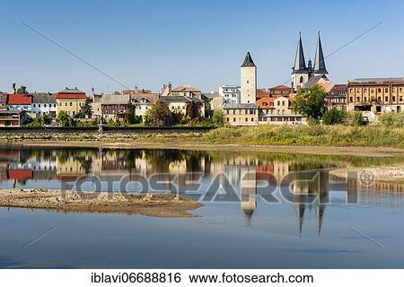 Old town with witch tower and Stephani church reflected in the river Saale, Calbe (Saale), Salzlandkreis, Saxony-Anhalt, Germany, Europe View Large Photo Image Stock Photograph - Old town with witch tower and Stephani church reflected in the river Saale, Calbe (Saale), Salzlandkreis, Saxony-Anhalt, Germany, Europe. Fotosearch