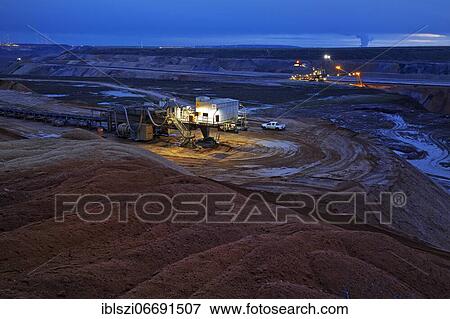 Opencast lignite mine in the evening, Garzweiler, Jüchen, Rhenish lignite mining area, North Rhine-Westphalia, Germany, Europe View Large Photo Image Stock Photo - Opencast lignite mine in the evening, Garzweiler, Jüchen, Rhenish lignite mining area, North Rhine-Westphalia, Germany, Europe. Fotosearch