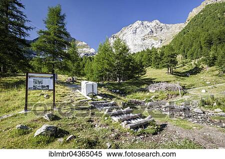 Outdoor museum of the ancient marble grinding path, Göflan Marble, Jennwand behind, Göflan, Vinschgau, Province of South Tyrol, Italy, Europe View Large Photo Image Stock Photography - Outdoor museum of the ancient marble grinding path, Göflan Marble, Jennwand behind, Göflan, Vinschgau, Province of South Tyrol, Italy, Europe. Fotosearch